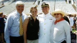 John Elliott, second from right, poses with his parents and sister at his Naval Academy graduation.