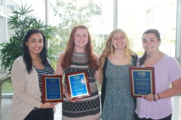 From left are Stockton University students Stephanie Campos of Pleasantville, first runner-up; Bailey Rogers of Mays Landing, second runner-up; Cherie Sloan of Sicklerville, 2016 HERO of the Year, and Vanessa Francesco of Somers Point, 2017 HERO of the Year.